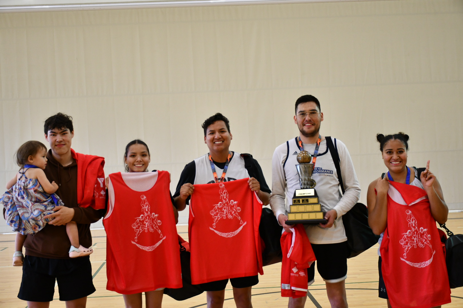 Division 2 Champions pose for a photo after the basketball tournament