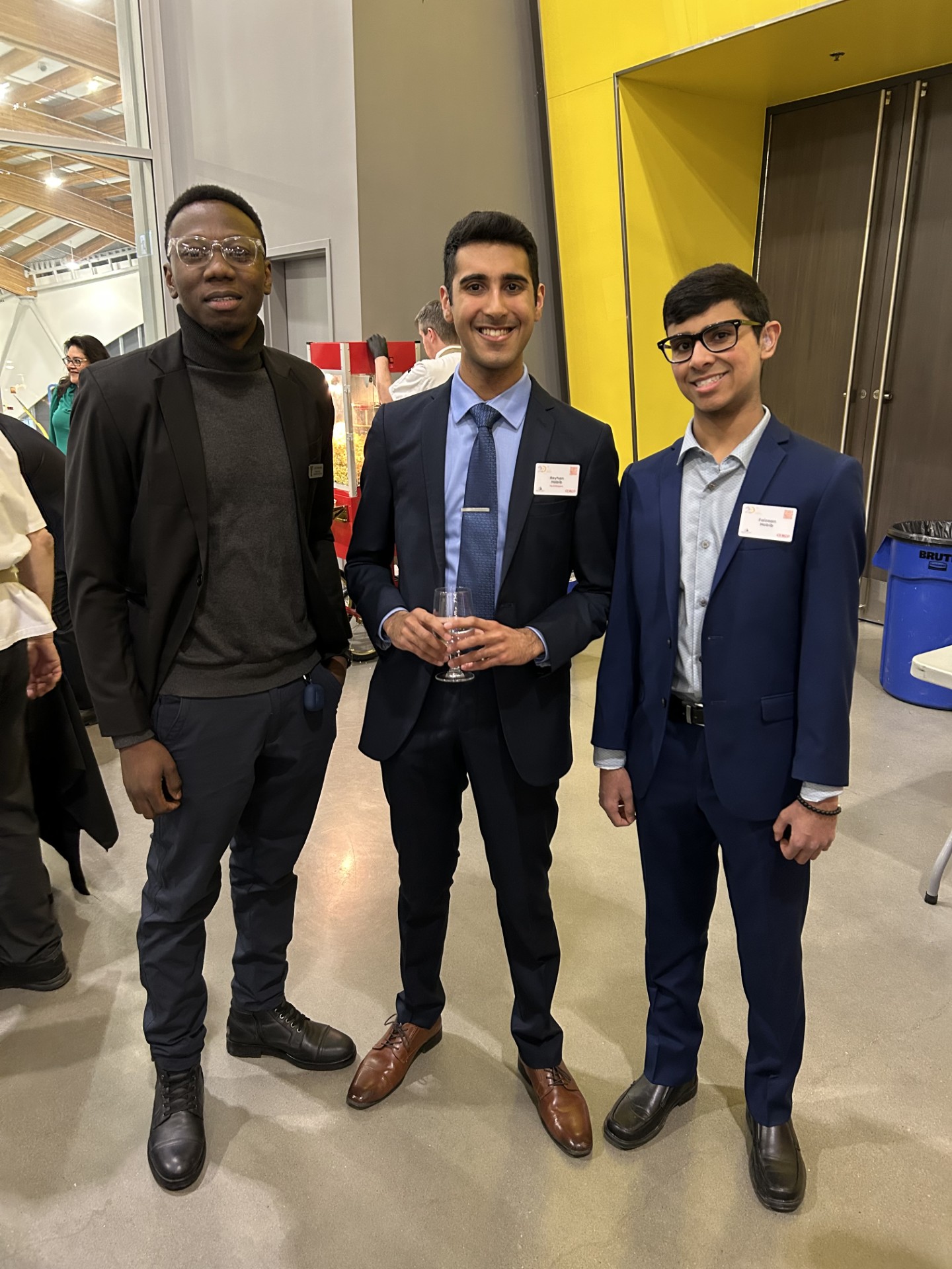 Louis Nnamdi of YMCA Calgary with Top 20 Under 20 Reyhan Habib and his brother