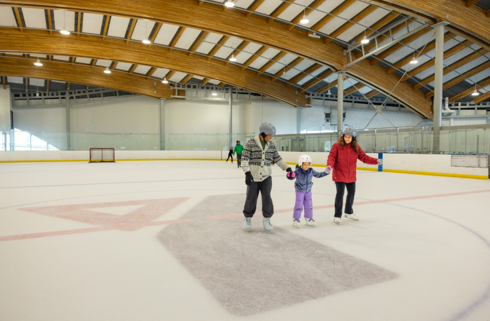 Family Skating on the Ice Rink at YMCA Calgary