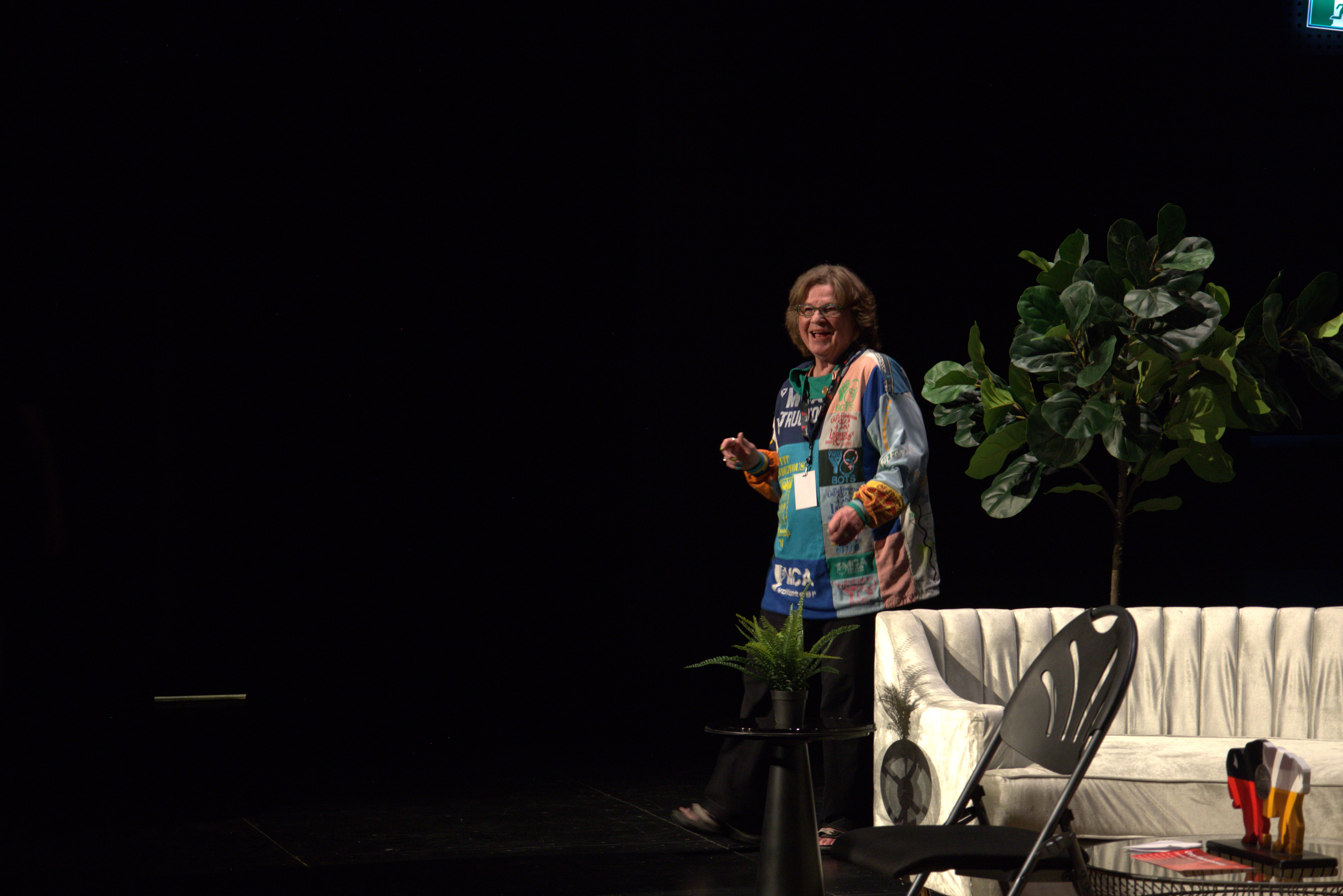 A senior woman leading a movement break