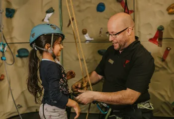 Girl and Climbing Instructor