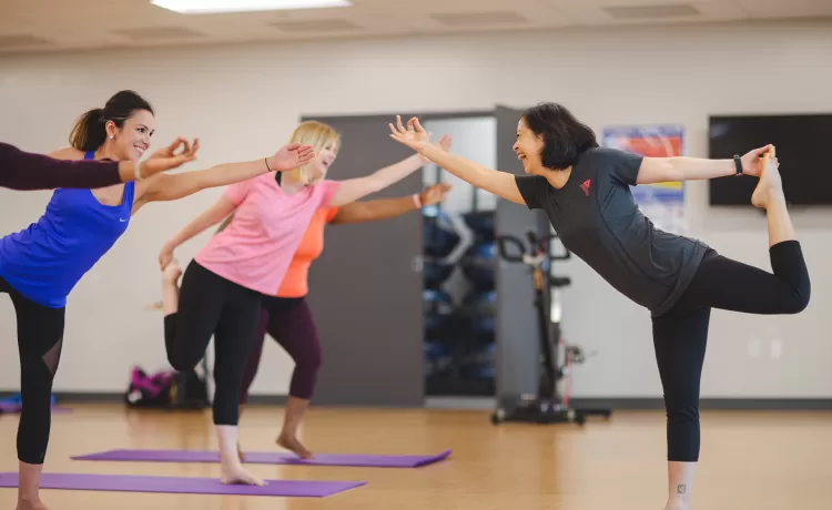 group of women doing yoga