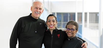 happy group of adults hugging