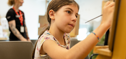 Youth painting at YMCA Calgary at Art Room