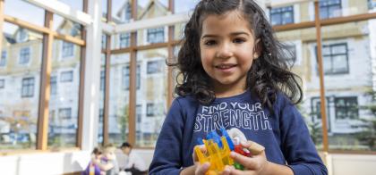 Child Playing with Toys