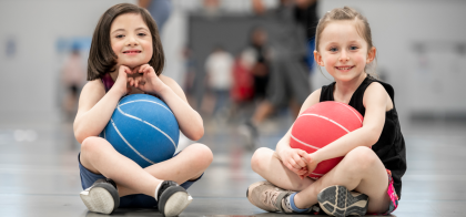 young girls playing in gymnasium