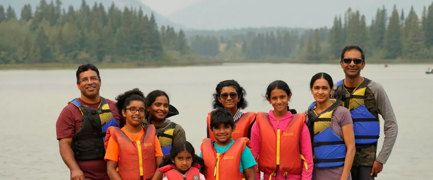 Family on canoe dock