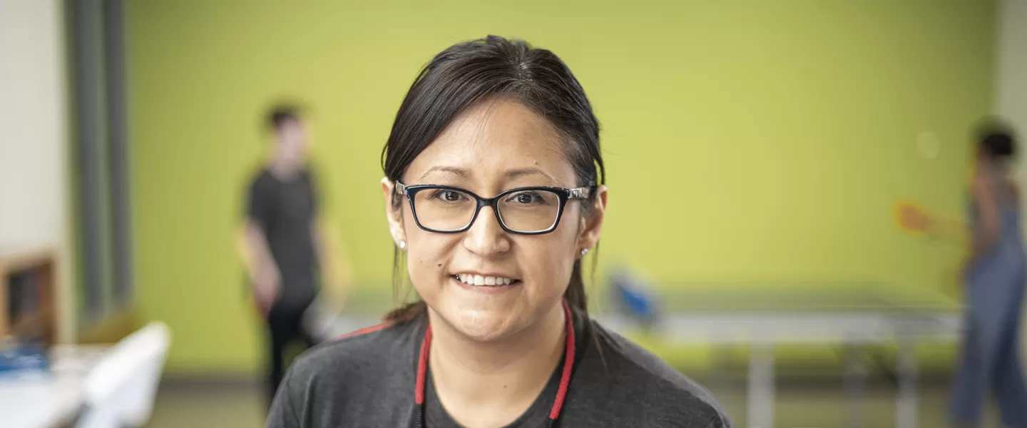 YMCA employee smiling