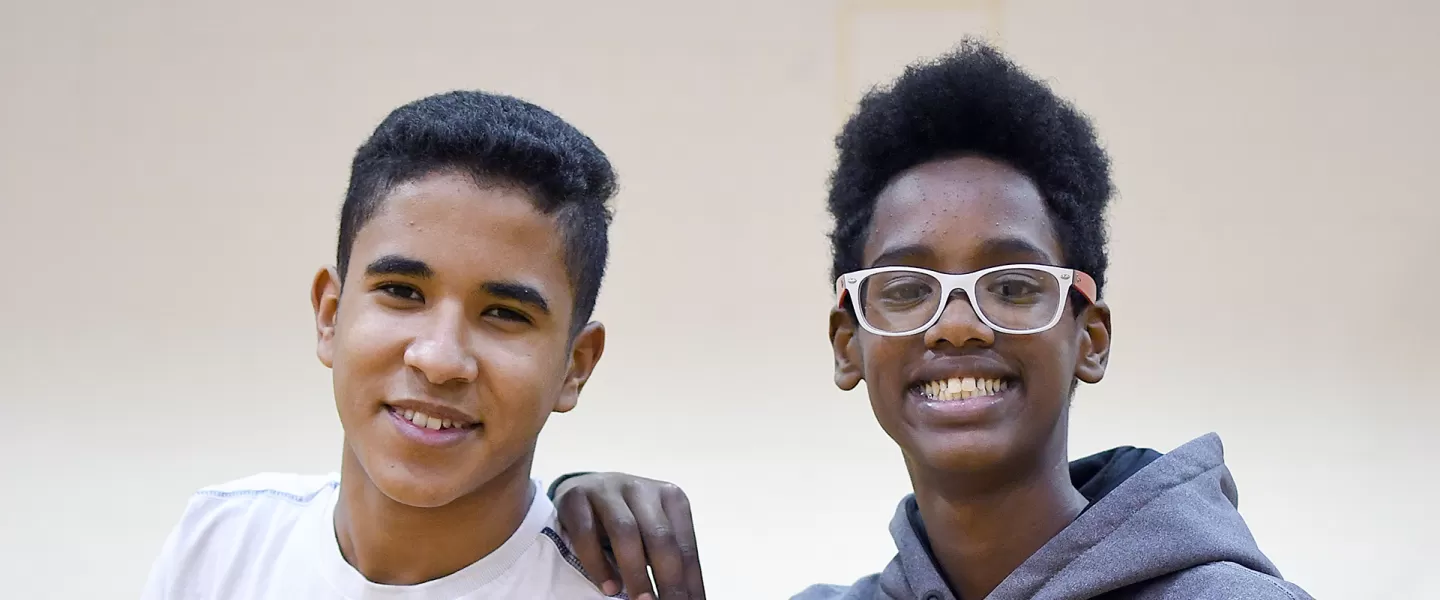 youth boys smiling in gymnasium