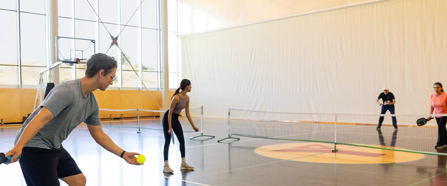Hey Neighbour Header - YMCA Calgary members playing Pickleball