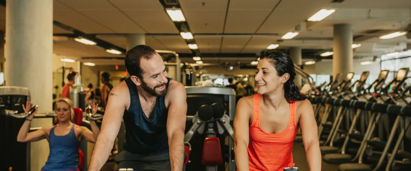 Man and woman in the weight floor at YMCA