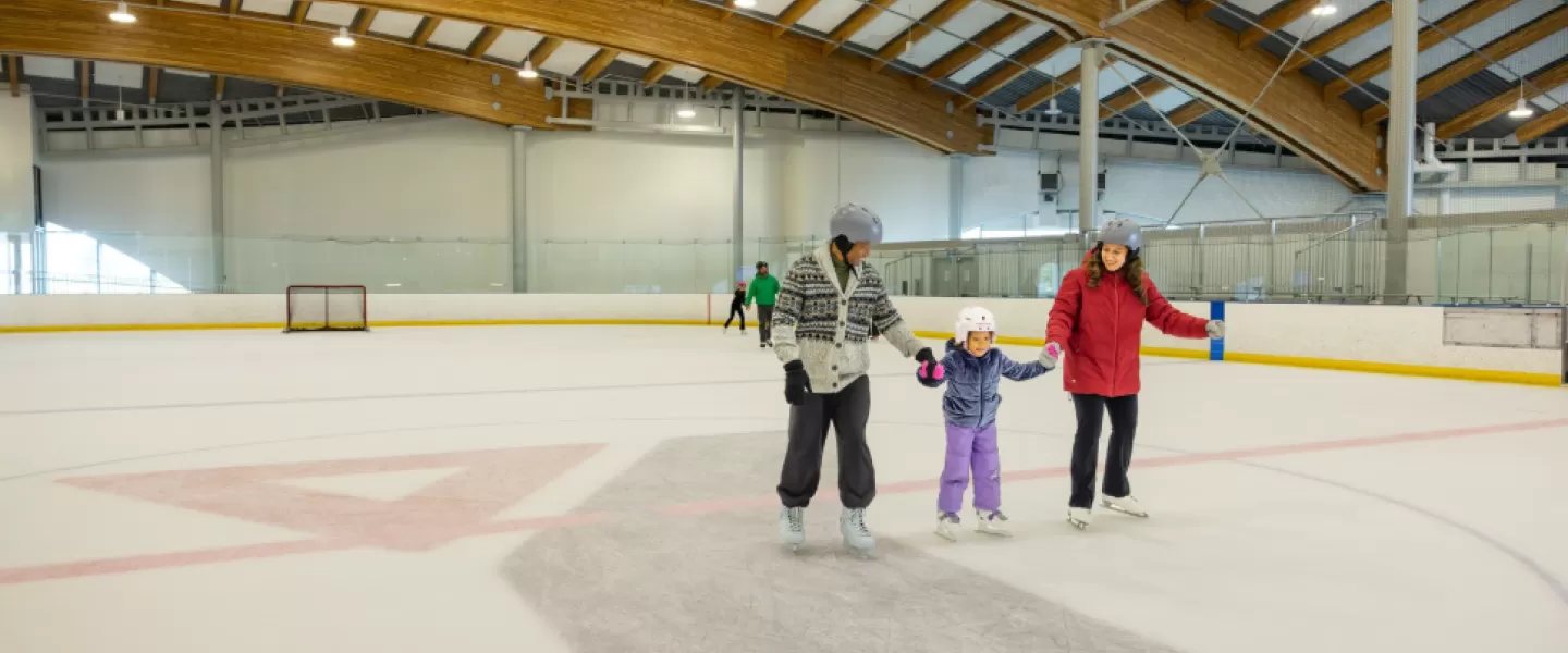 Family Skating on the Ice Rink at YMCA Calgary
