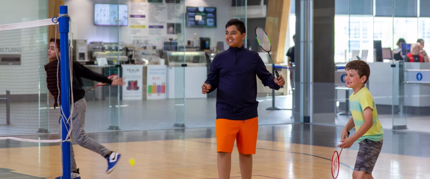 Day Camp Supervisor and kids in the gym