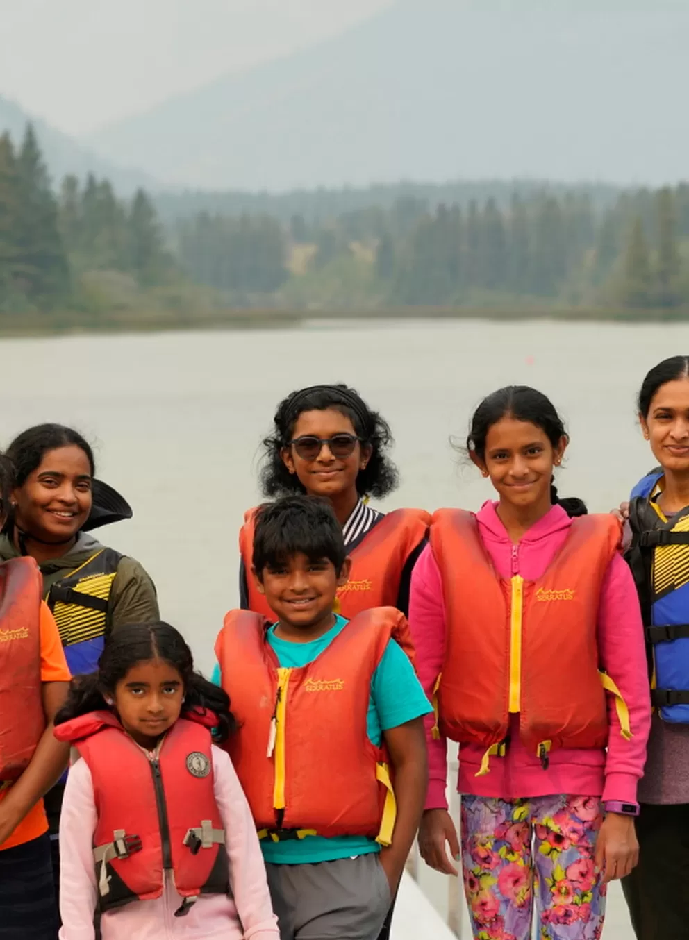Family on canoe dock