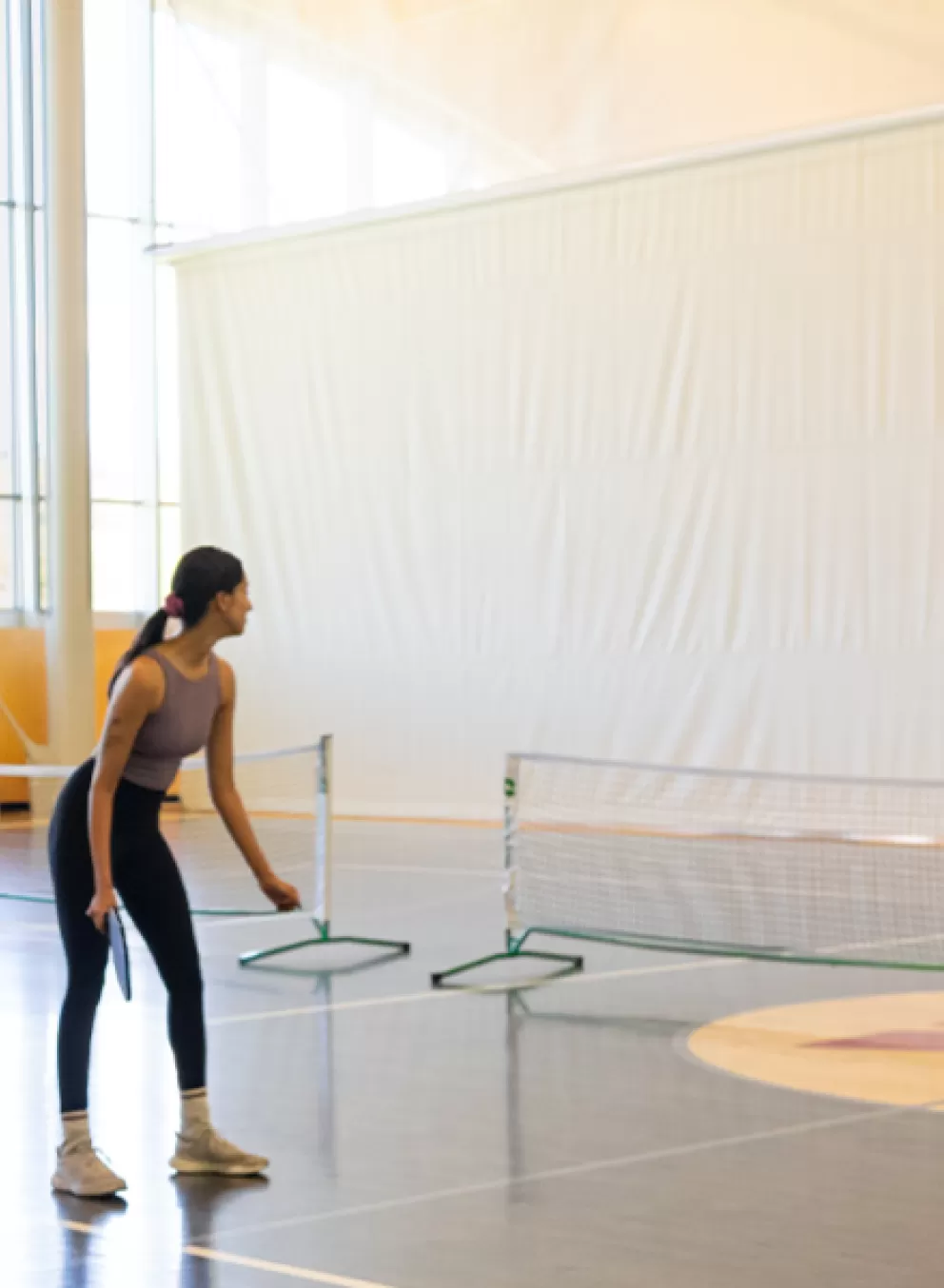 Hey Neighbour Header - YMCA Calgary members playing Pickleball