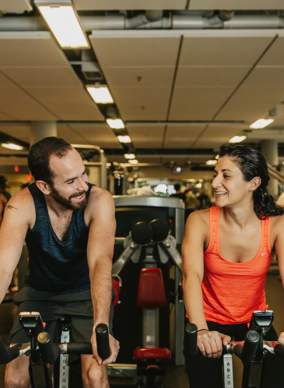 Man and woman in the weight floor at YMCA