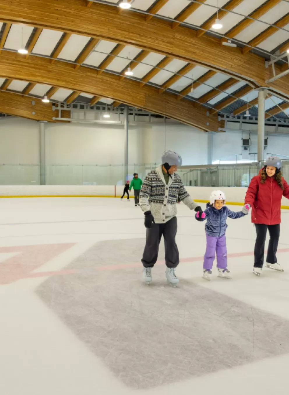 Family Skating on the Ice Rink at YMCA Calgary