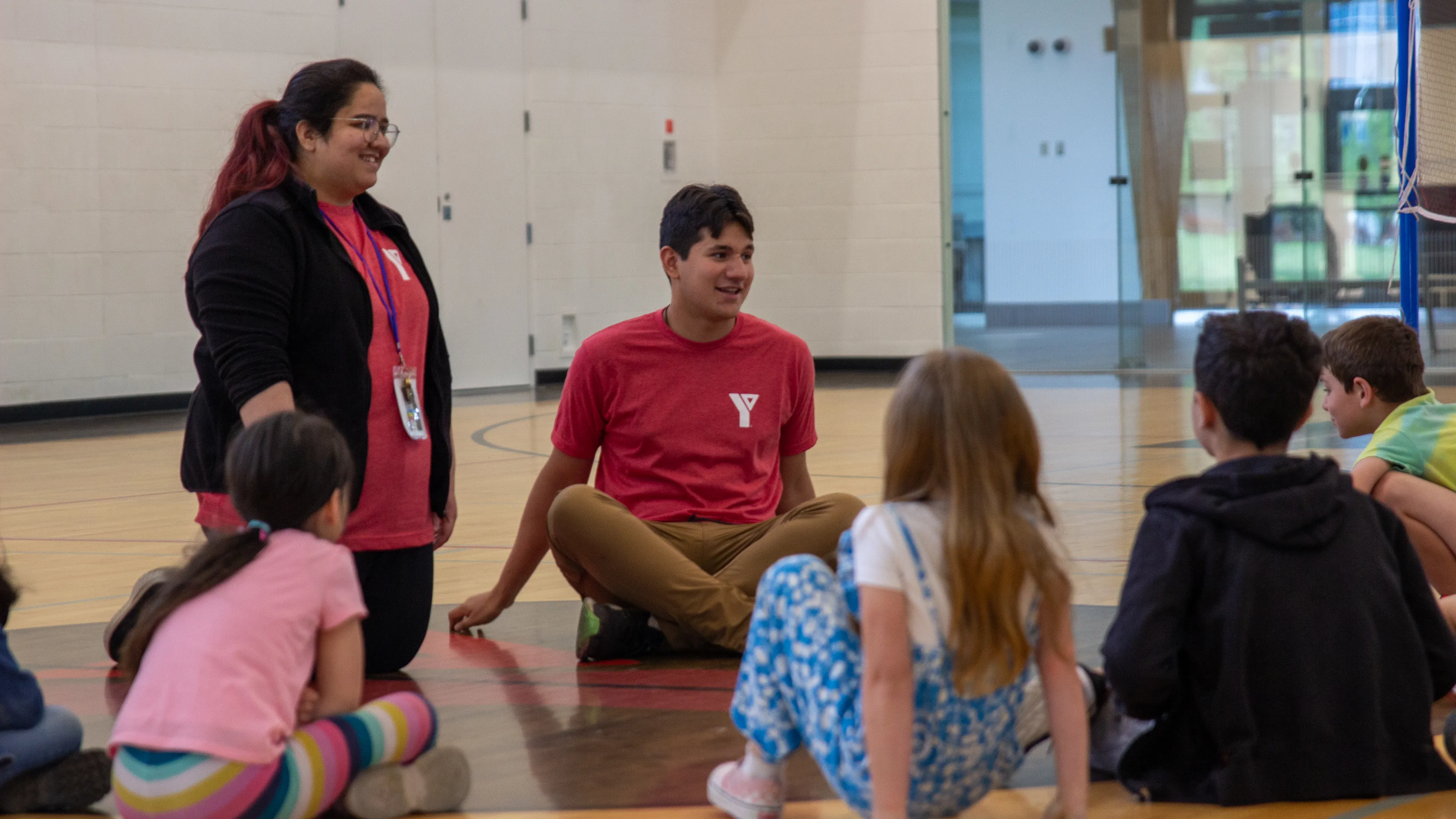 Two Day Camp Supervisor and kids in the gym