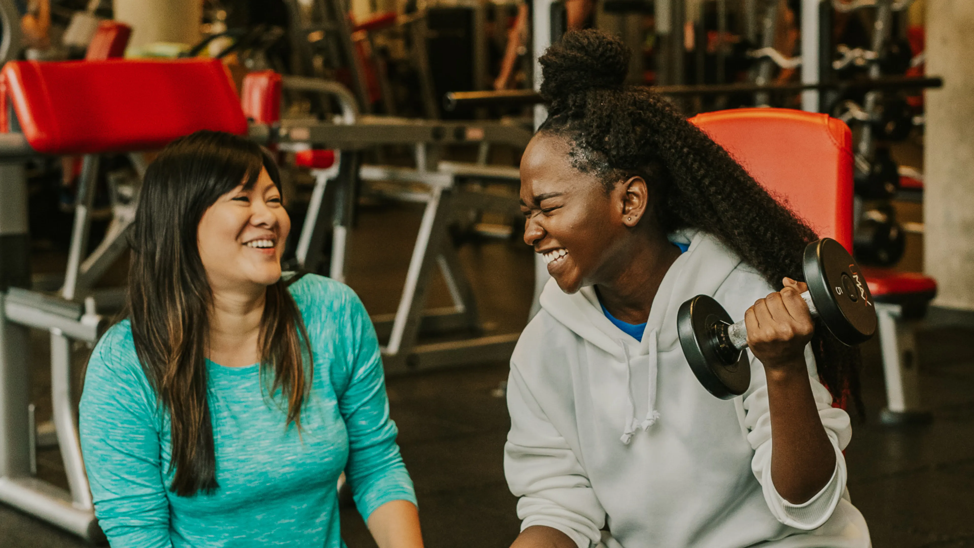 Two ladies on the weight floor