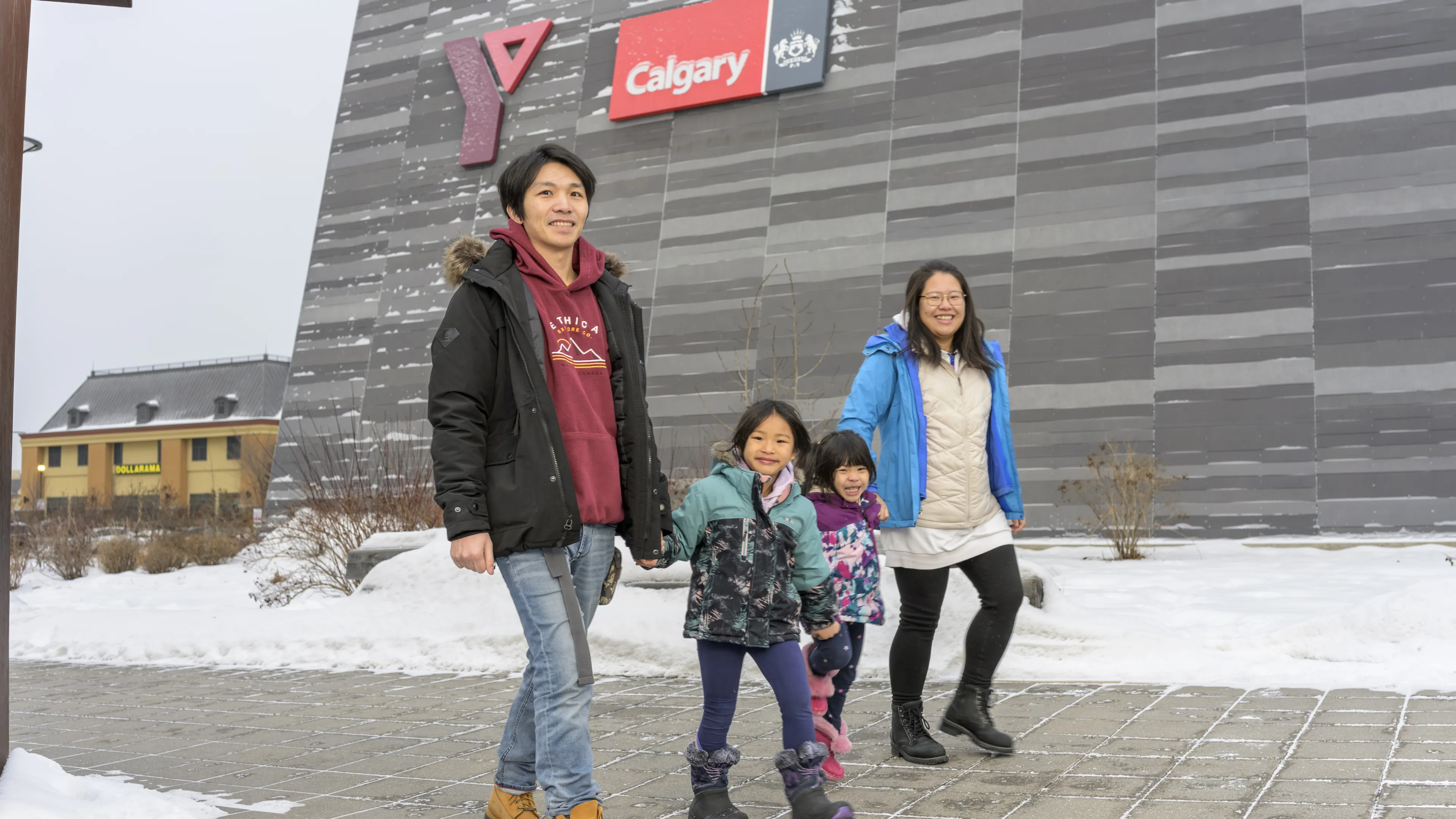 family walking to the Y in winter