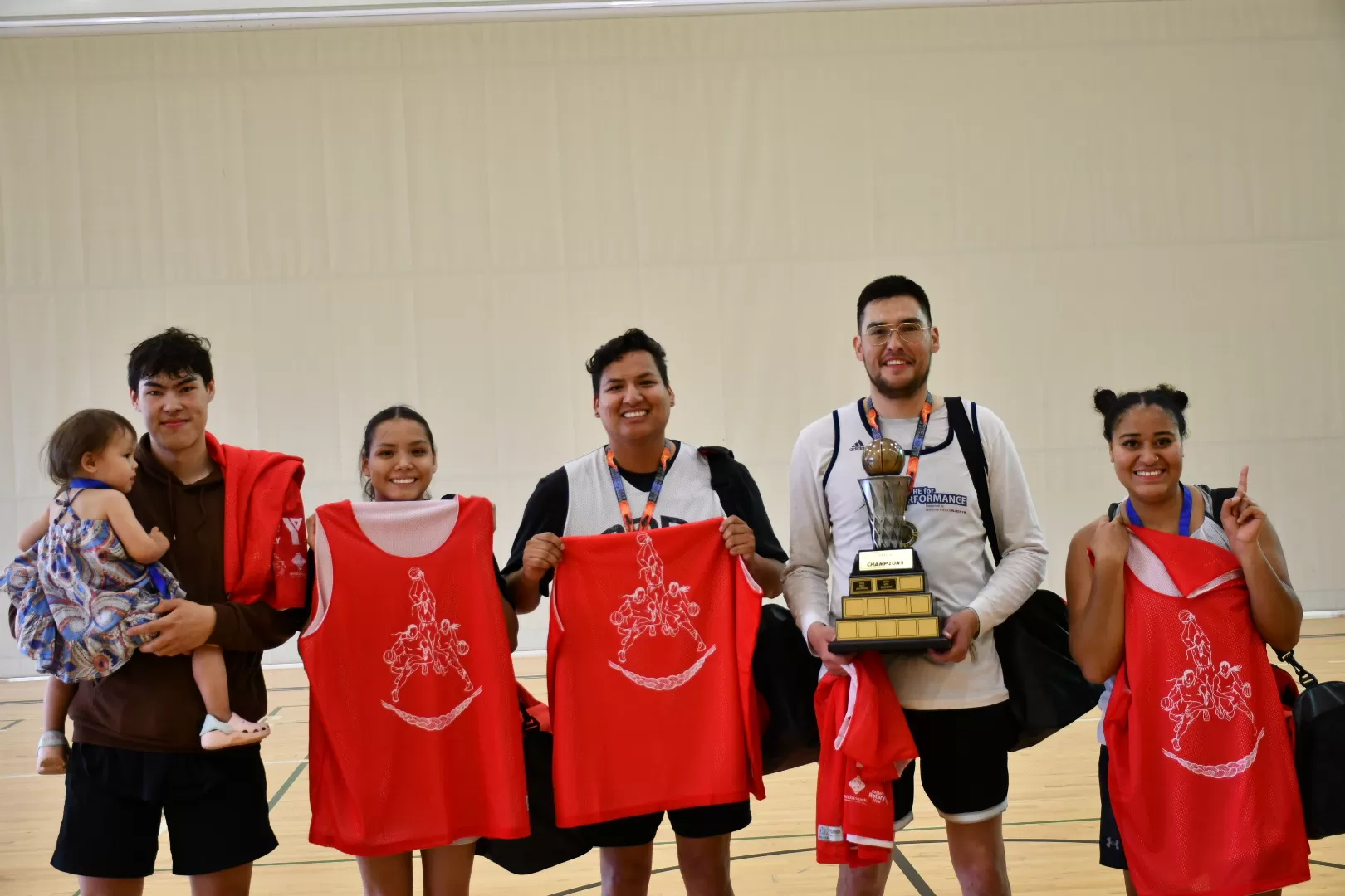Division 2 Champions pose for a photo after the basketball tournament