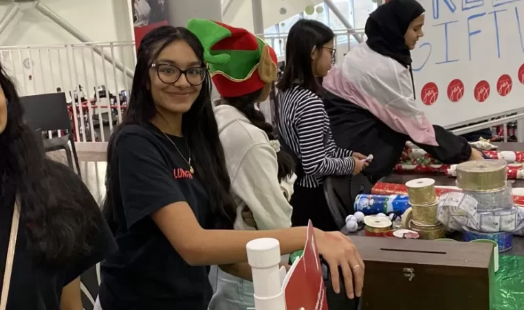Naqeeyah volunteering at Shane Homes YMCA at Rocky Ridge