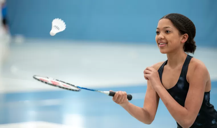 Youth Playing Badminton at YMCA Calgary