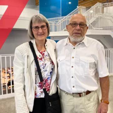 Wendy and Ernie stand side by side at Shane Homes YMCA at Rocky Ridge 