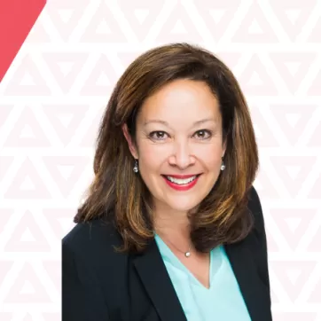 Jerilynn Daniels is seen on a white background with faded red triangles alongside the Y and RBC logos
