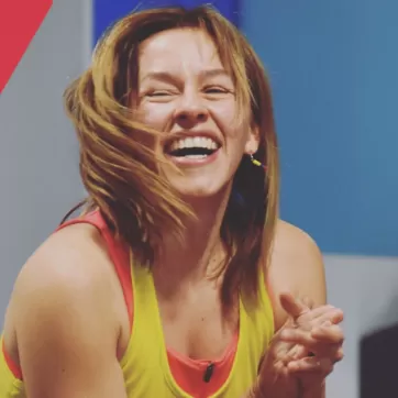 Liliana dons a smile while teaching a Zumba class