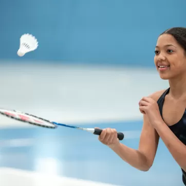 Youth Playing Badminton at YMCA Calgary