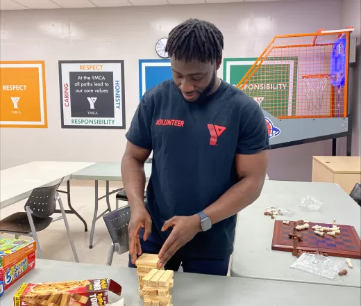 Youth program volunteer at Shawnessy YMCA preparing games for the Calgary Flames Grade 6 Program