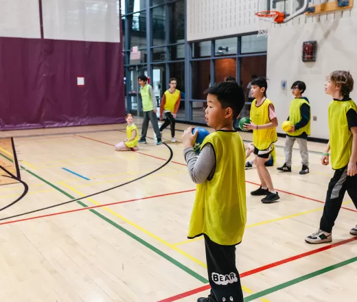 A group of children playing a team sport.