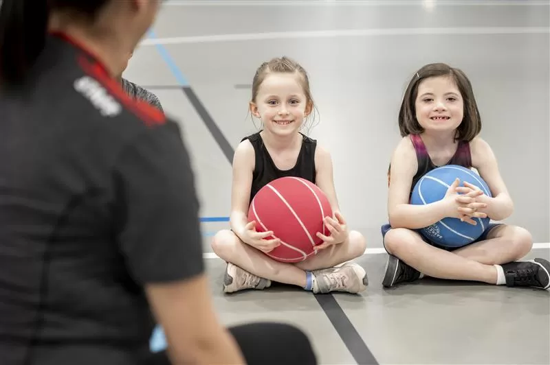 YMCA School Service Disruption Support - Kids sitting with balls