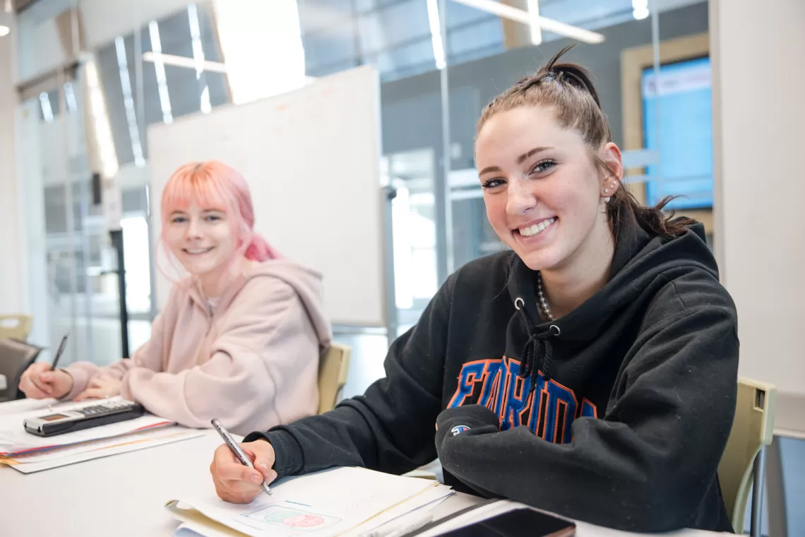 Tutor working with student at Tutoring Table Program YMCA Calgary