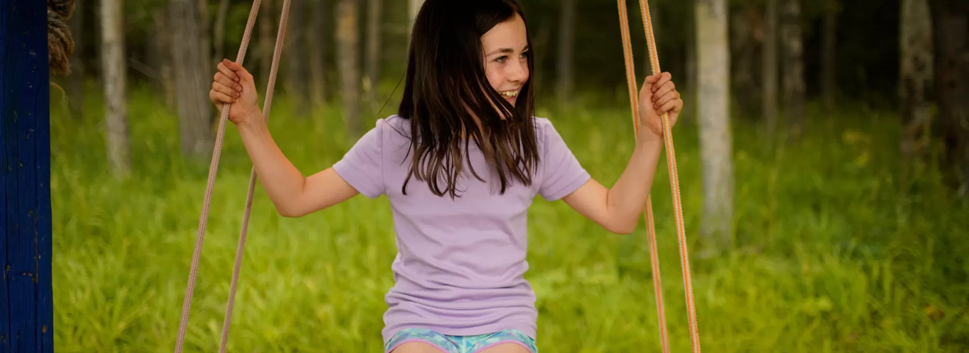 Girl on a swing in the outdoors