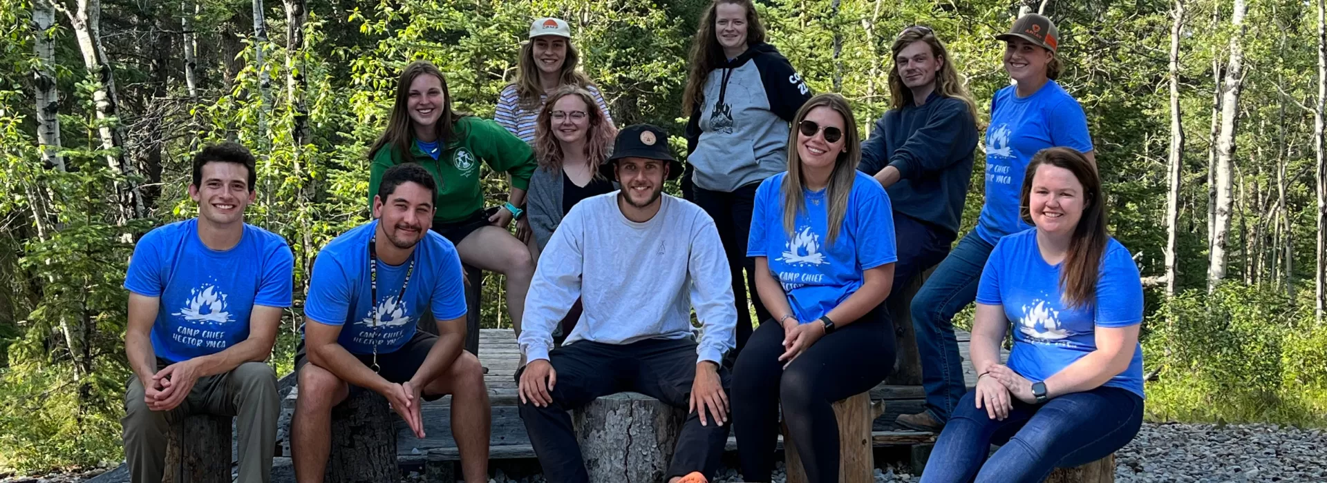 CCH staff team around firepit