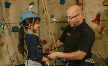 Girl and Climbing Instructor